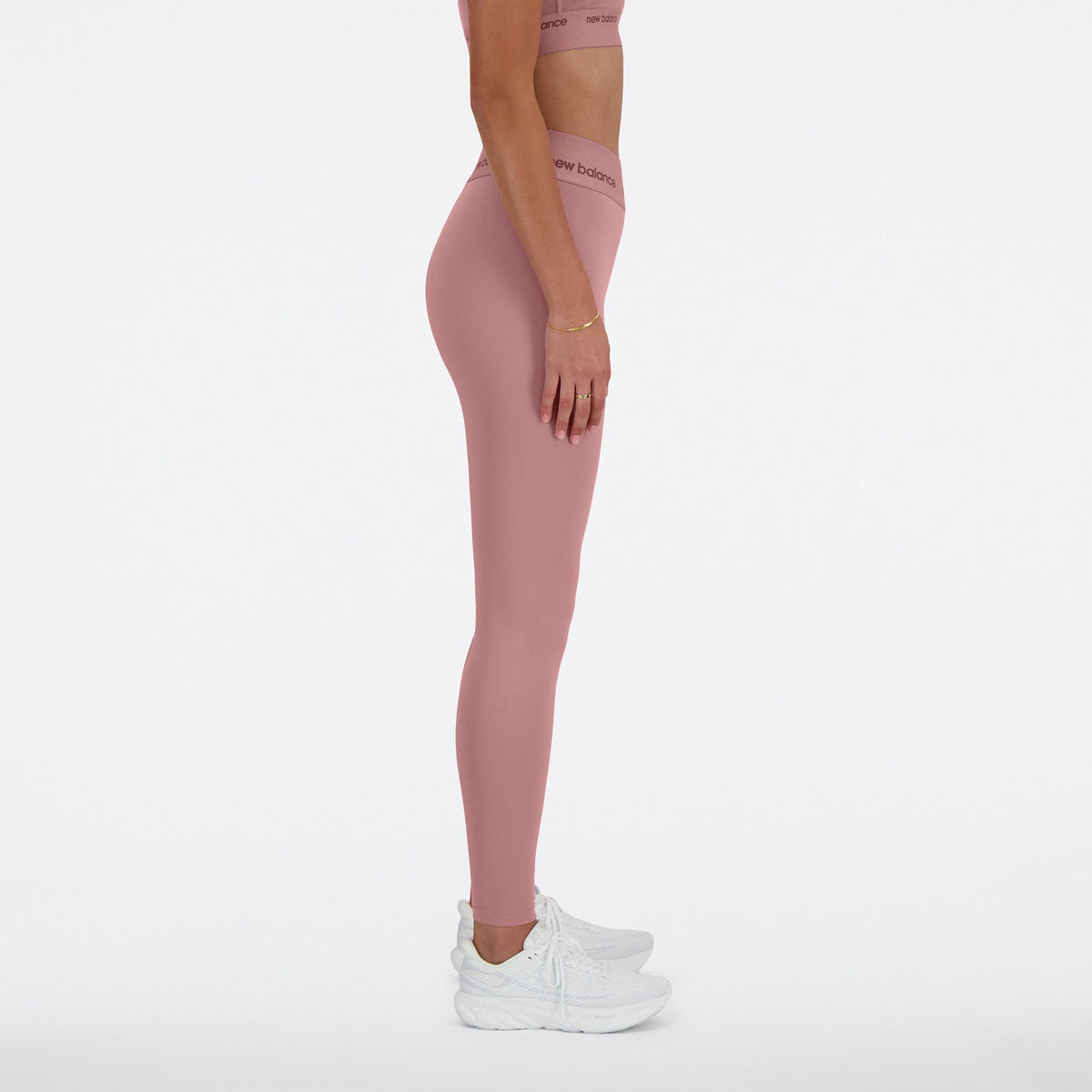 New Balance Peach Woman's Trackpant-WP41177