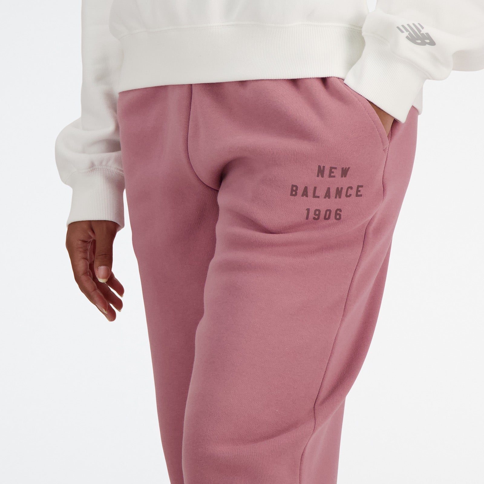 New Balance Peach Woman's Trackpant-WP41508